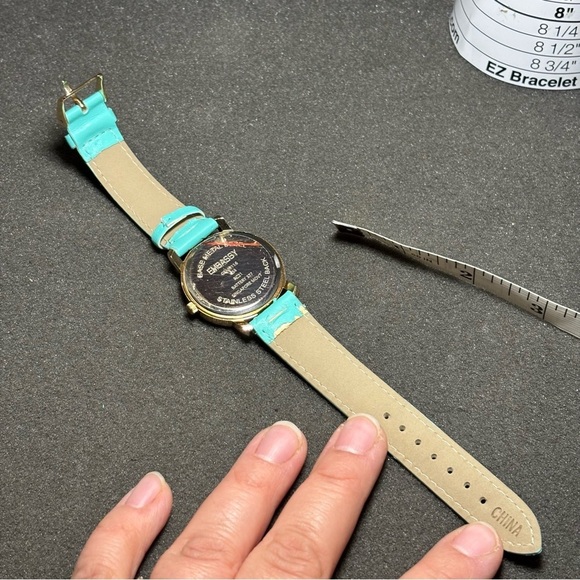 Embassy Ladies Quartz Watch Gold Tone White Dial Teal Band Working GEM9116 - Picture 4 of 7